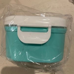 Small travel formula canister.